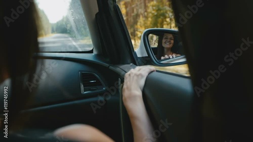 Wallpaper Mural cheerful young woman traveling by car Torontodigital.ca
