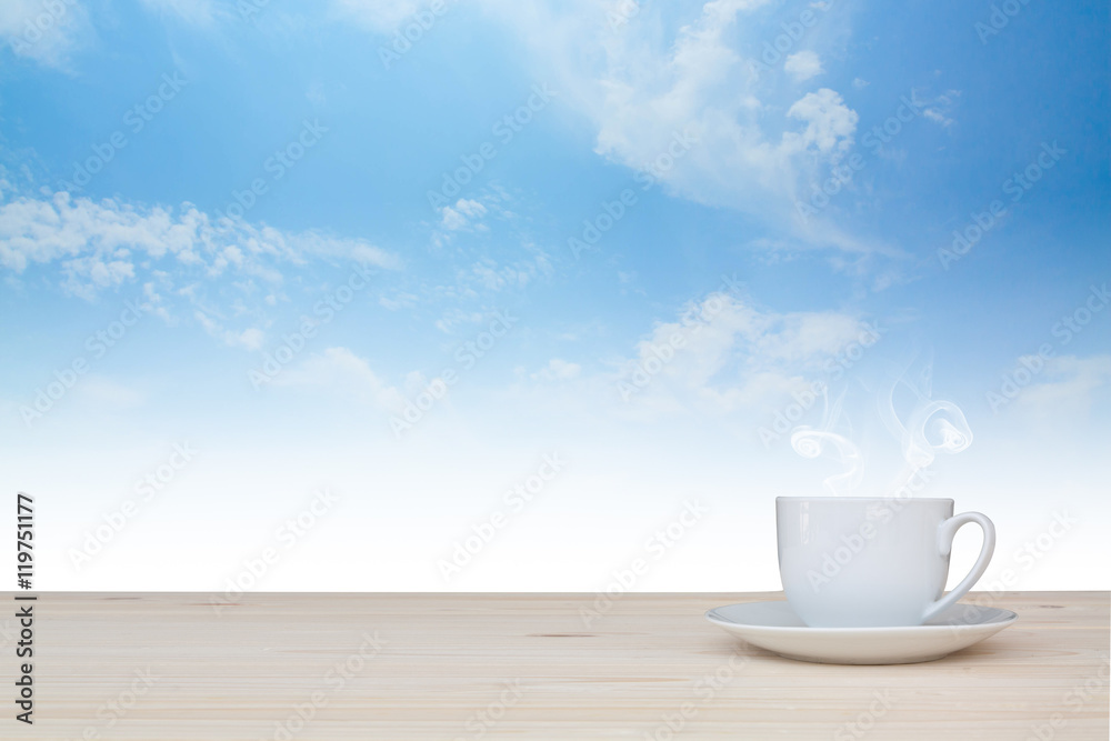coffee cup on the table with beauty bule sky background