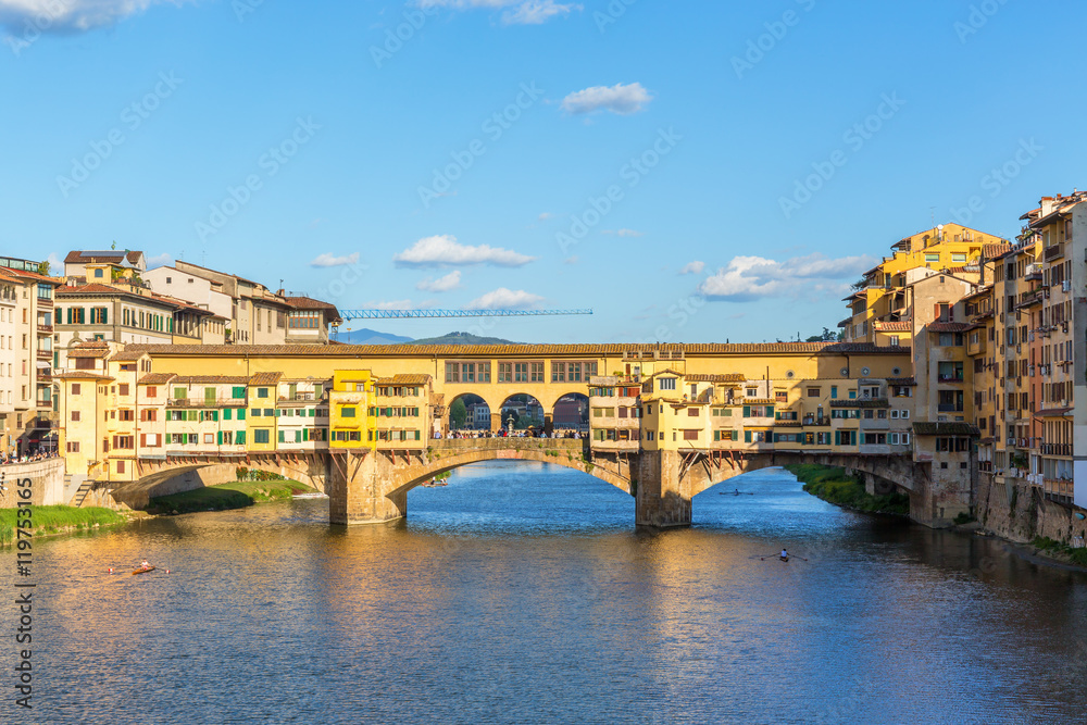 Ponte Vecchio bridge with canoes on the River Arno in Florence