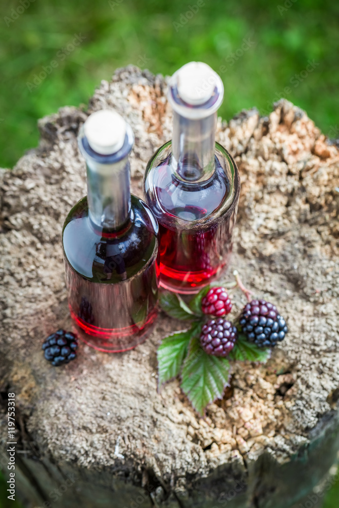 Fresh liqueur made of blackberries and alcohol Fresh liqueur made of blackberries and alcohol