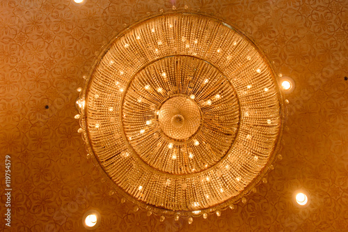 Close-up of a beautiful crystal chandelier.Close-up of a beautif photo