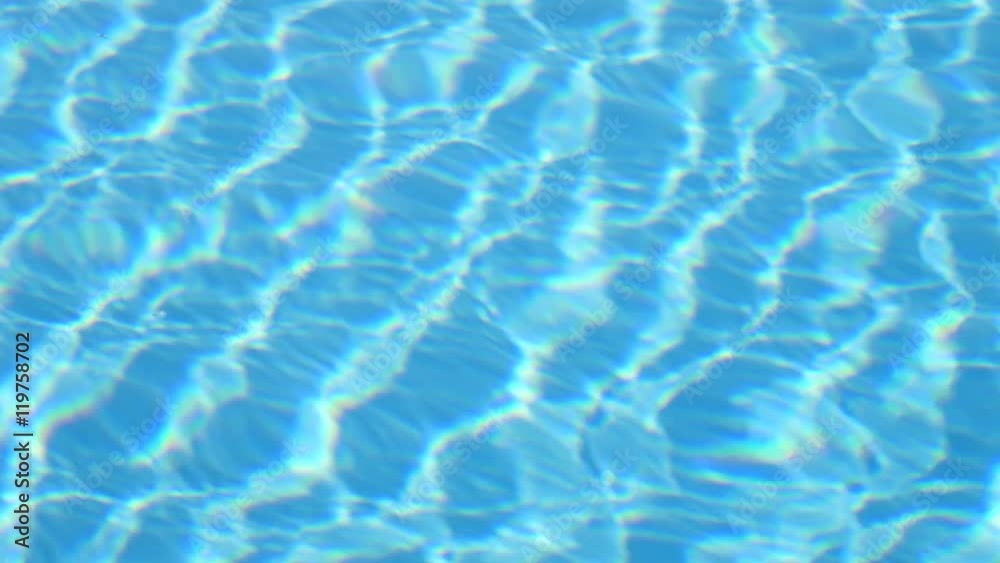 Blue water in swimming pool. Water motion