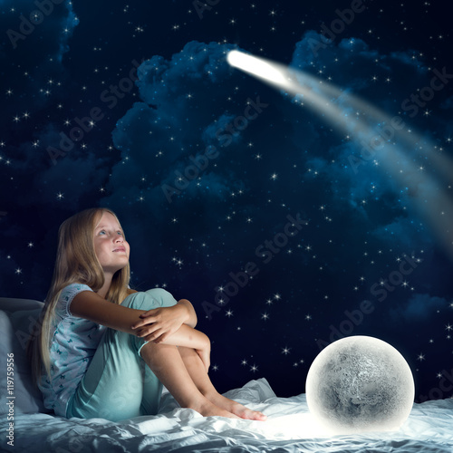 Girl in her bed and moon planet