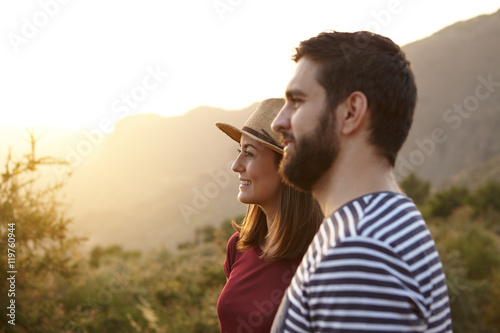 Young couple looking out over mountains
