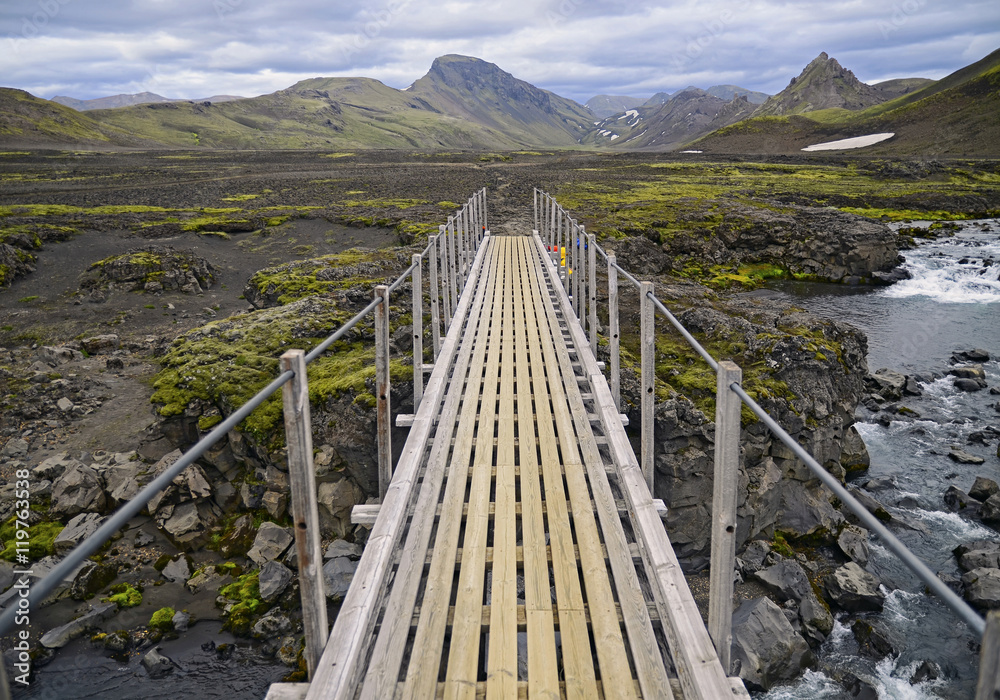 Bridge over the river . View  on   amazing  valley in Europe National Park in Iceland 