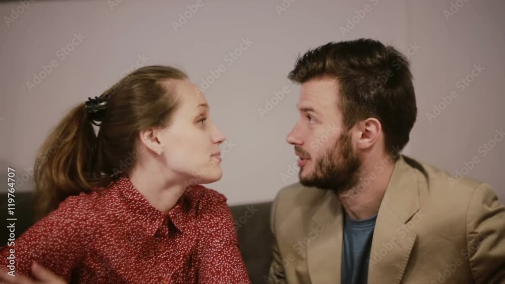 A couple in love, having a conversation, reminiscing, laughing and having a great time A couple in love, having a conversation, reminiscing, laughing and having a great time