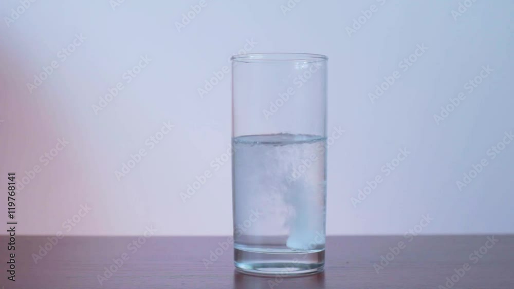 the Effervescent Tablet in a Glass of Water. Aspirin. Slow Motion the Effervescent Tablet in a Glass of Water. Aspirin. Slow Motion