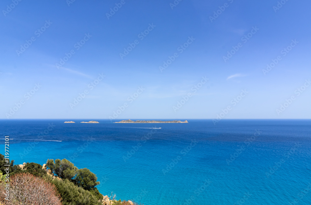 Tropical vacation beach sea view concept photo. Beautiful landscape of Tyrrhenian mediterranean turquoise perfect sea with sailing boats under the clear blue sky on sunny day, copy space for text