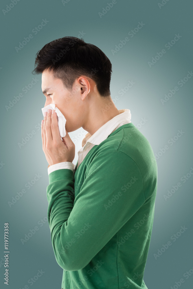 Sneezing asian man Sneezing asian man