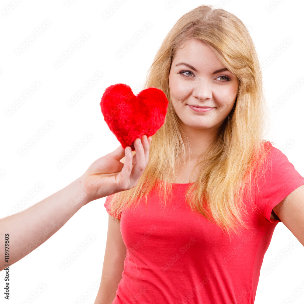 Couple in love. Man giving woman red heart Couple in love. Man giving woman red heart