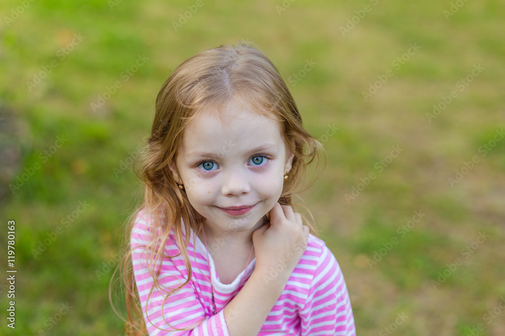 Portrait of a cute girl with long blond hair Portrait of a cute girl with long blond hair