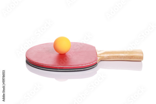 Table Tennis bat with yellow ball photo