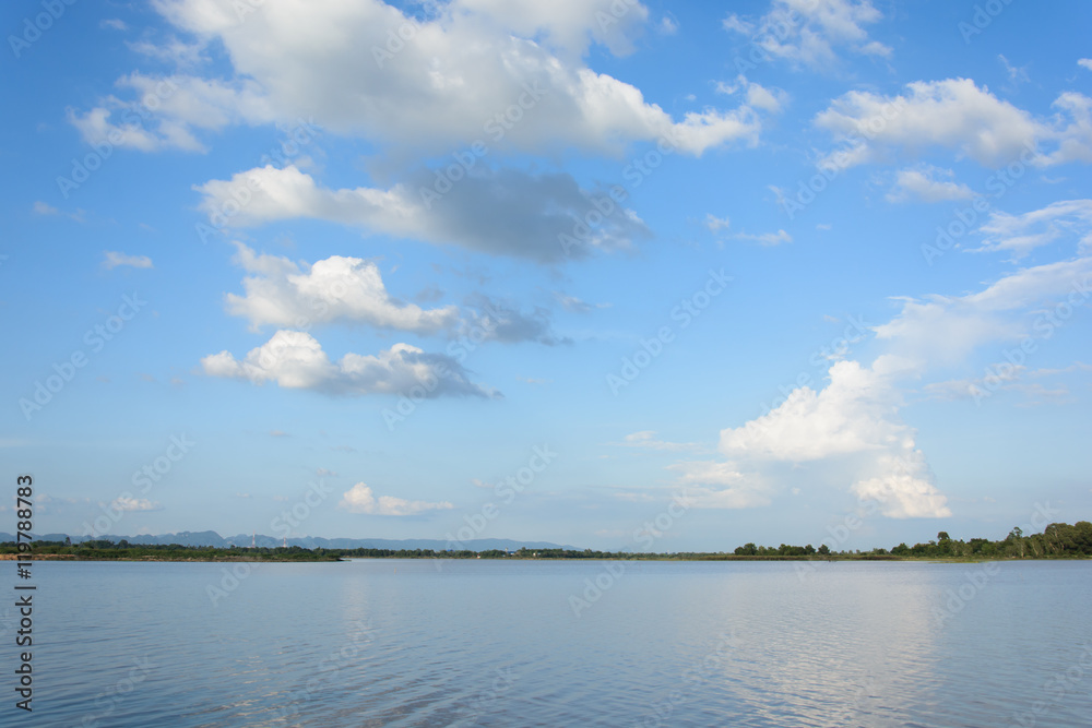 landscape with river and blue sky..
