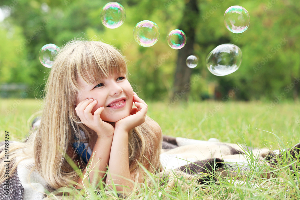 Portrait of little girl in the park