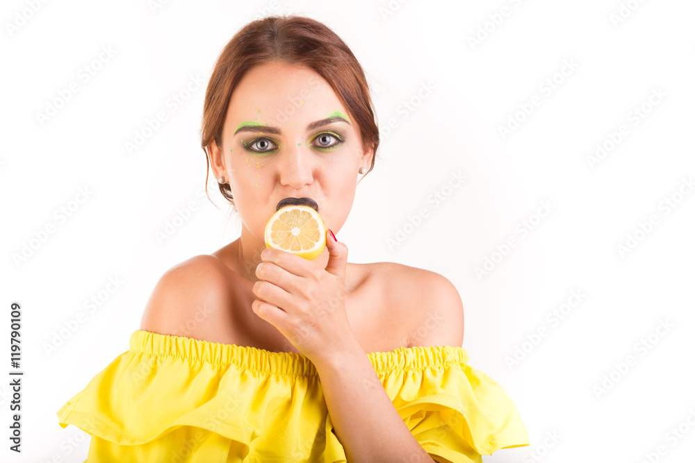 sexy brunette with bright creative makeup licks lemon sexy brunette with bright creative makeup licks lemon