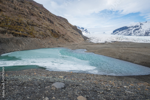 The pool getting frost in Skaftafell national park of southern Iceland.