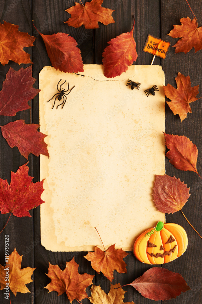 Fototapeta premium Halloween invitation over wooden background