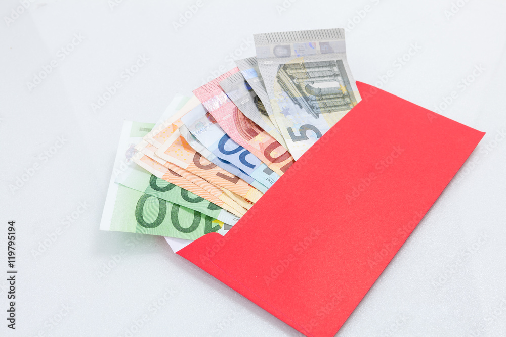 Money in a bright red envelope. Money in a bright red envelope.
