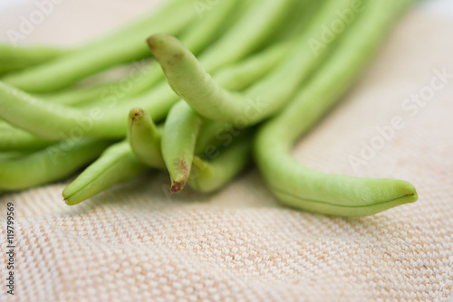 fresh green beans on gunny