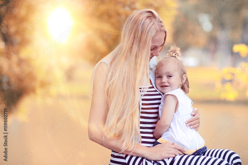 Mom daughter Autumn sunset portrait Mom daughter Autumn sunset portrait