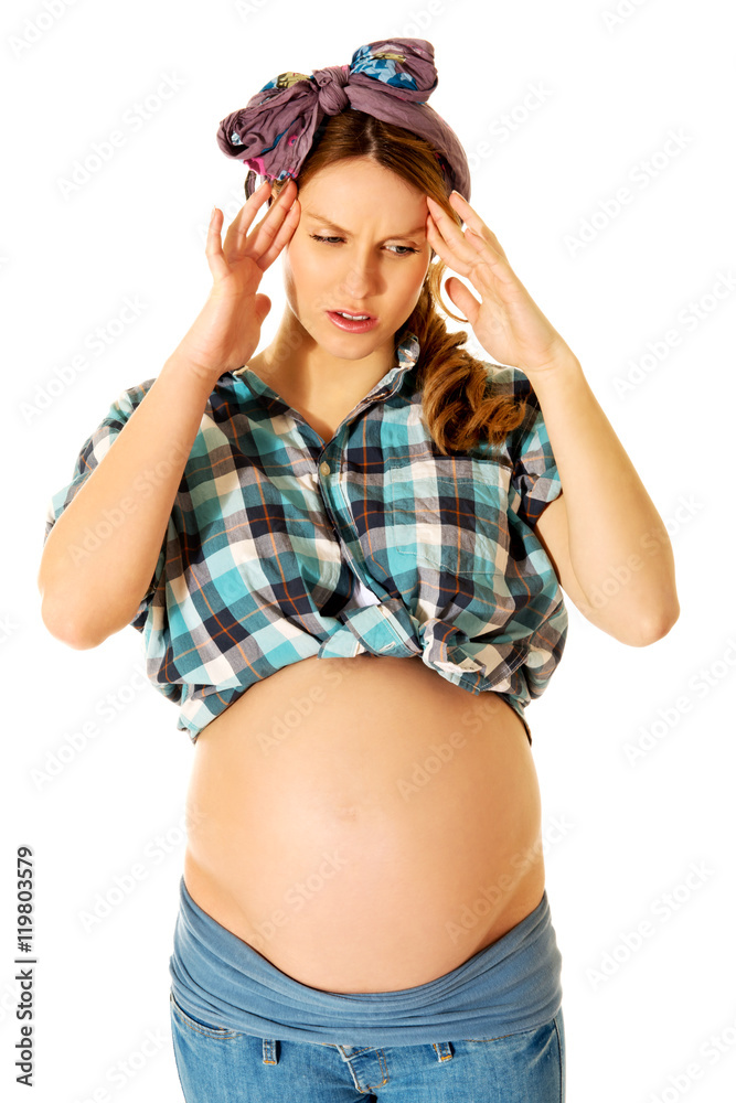 Fototapeta premium Tired pregnant woman with headache
