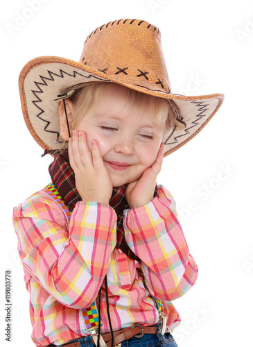 little girl dressed as a cowboy