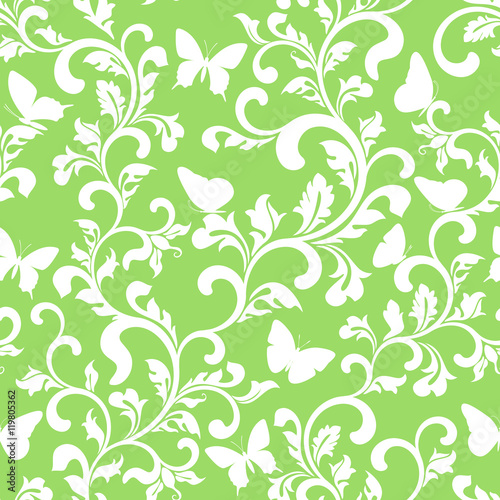 Seamless pattern with plants and butterflies on a green background