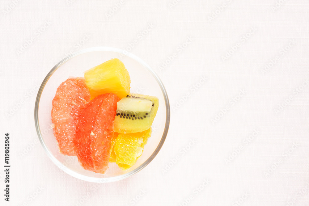Assorted choice of fruits on pink background