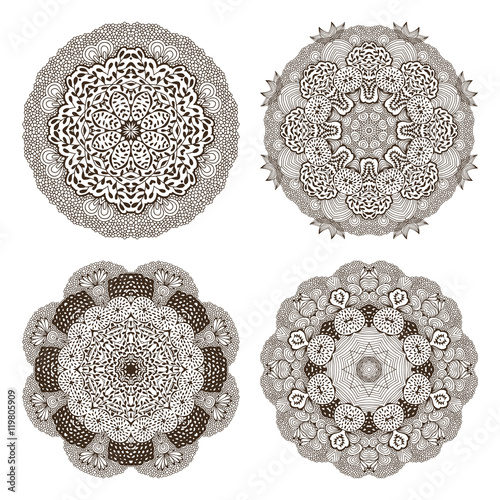 Set of round decorative ornaments, black and white floral pattern
