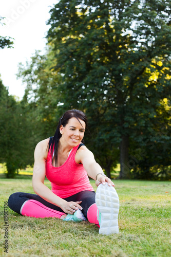 young woman exercising in the park