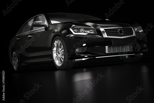Modern black metallic sedan car in spotlight. Generic desing, brandless.