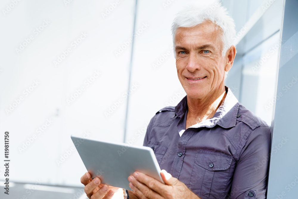 Handsome businessman in office Handsome businessman in office
