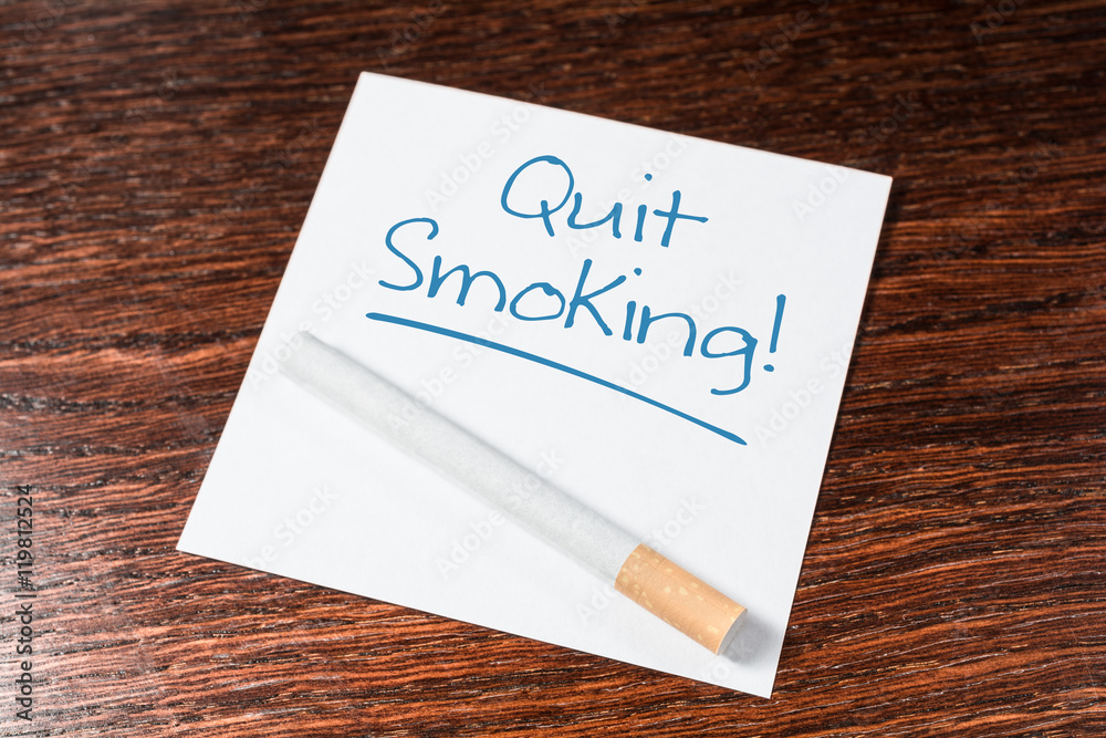 Quit Smoking Reminder With Cigarette On Wooden Shelf Quit Smoking Reminder With Cigarette On Wooden Shelf