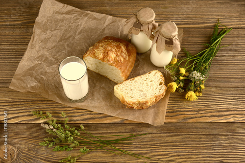 Natural dairy products in a rustic style on the wooden background