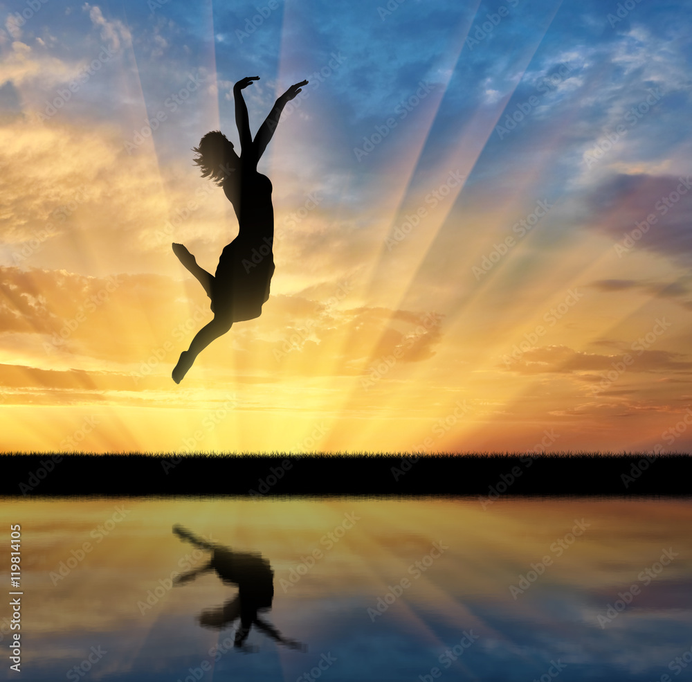 happy woman jumping at sunset happy woman jumping at sunset