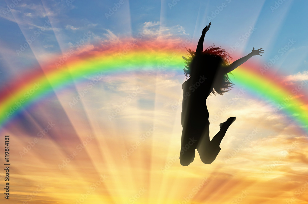 Happy woman jumping near rainbow - obrazy, fototapety, plakaty 