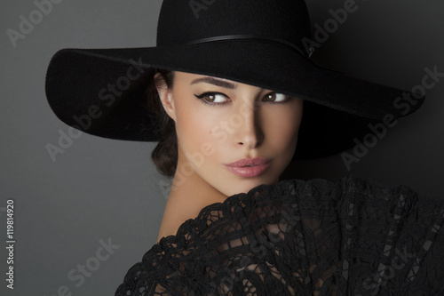 woman with black hat
