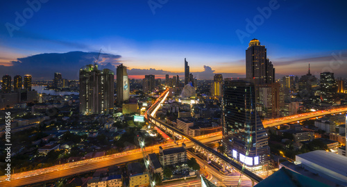 Bangkok Transportation at Dusk with Modern Business Building along the river  Thailand 