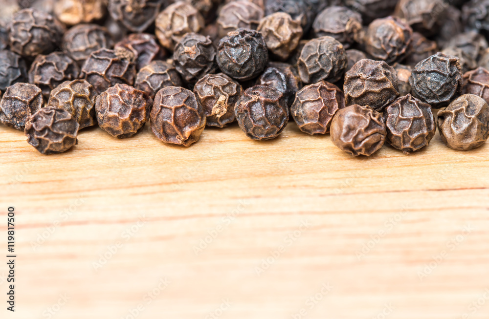Obraz premium Macro of black peppercorns - black pepper grains.