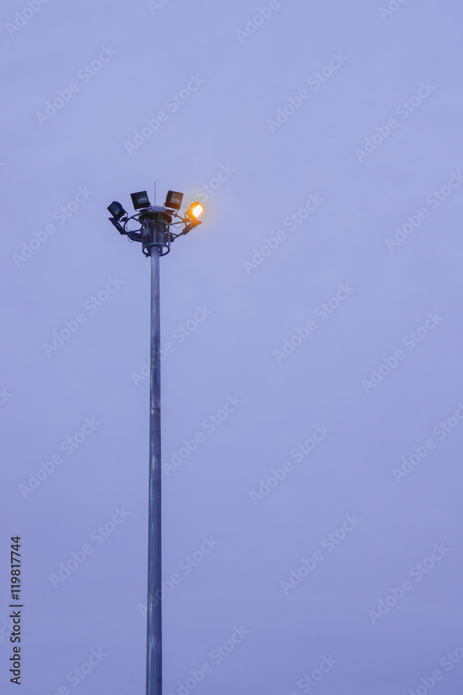 Fototapeta premium Security lights on top of a tall steel mast