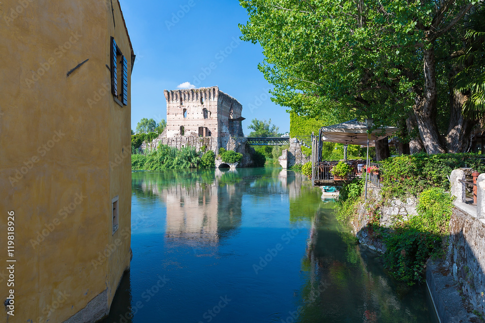medieval building upon the Mincio river in Borghetto