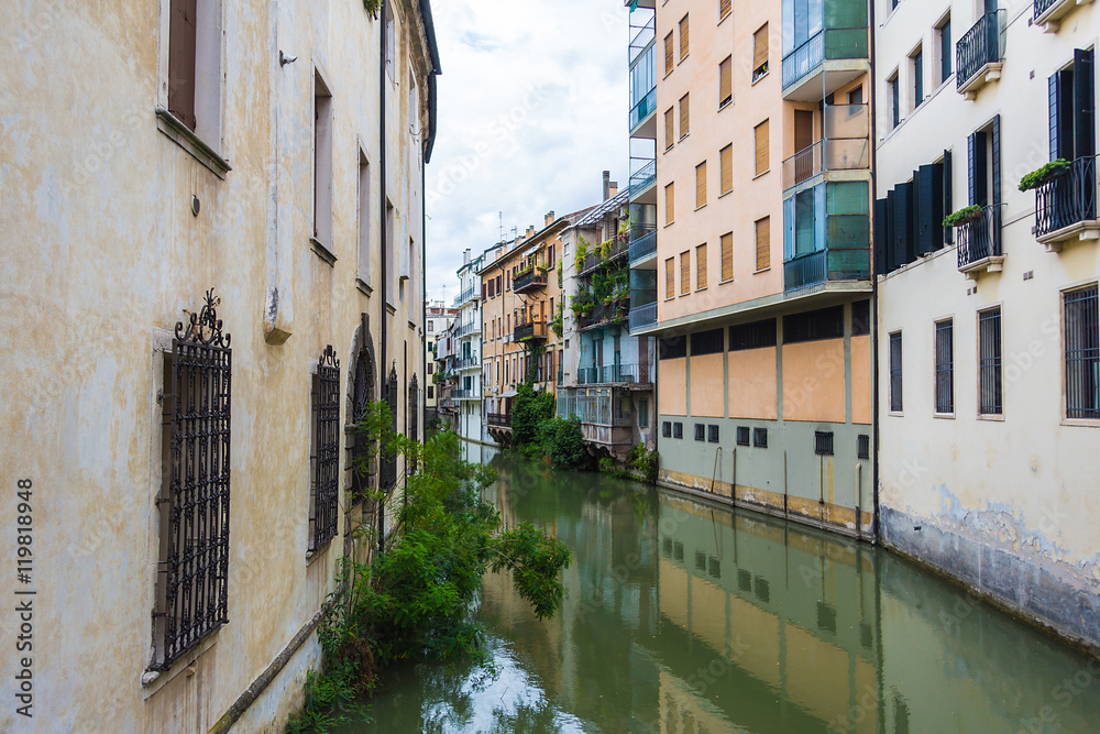 canal San Massimo runs among residential houses in the centre of the old city Padua