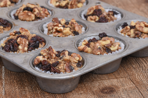 Fresh walnut muffins in pan