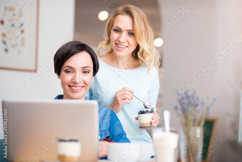 Cute women working together