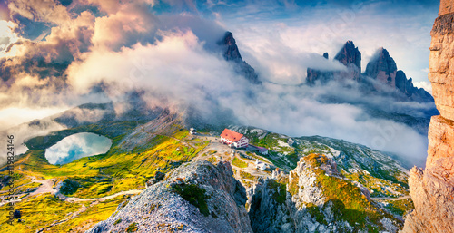 Foggy morning scene in the Alps