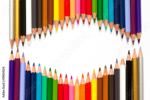 Row of color pencil on white background