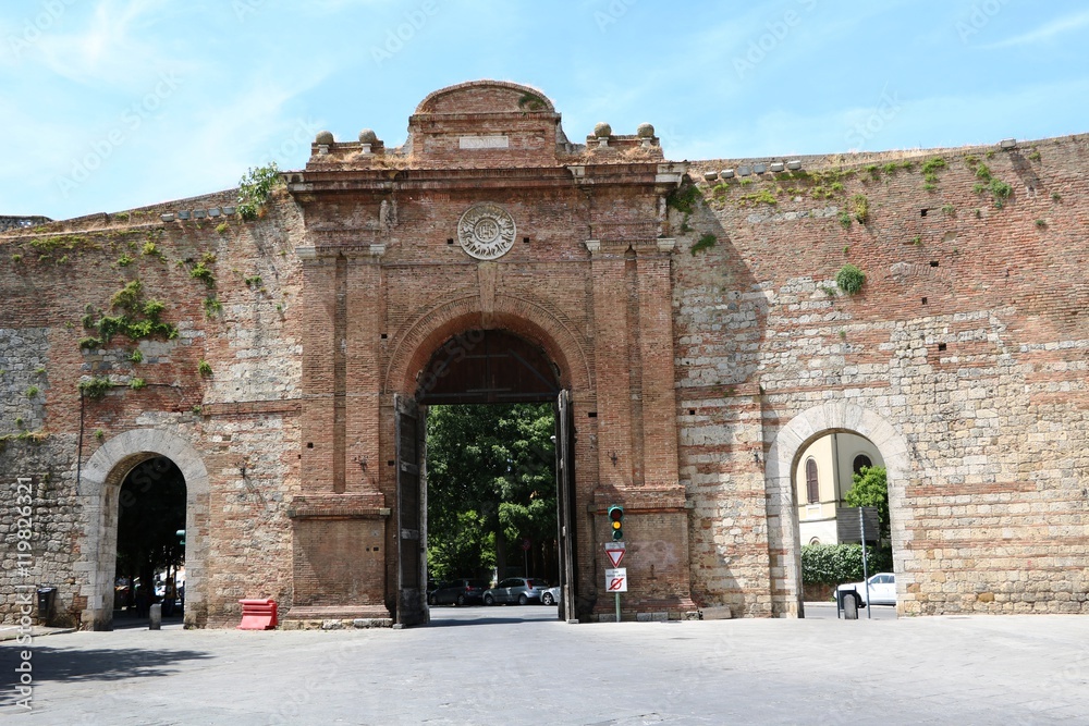 Fototapeta premium Porta Camollia is a city gate in Siena, Tuscany Italy