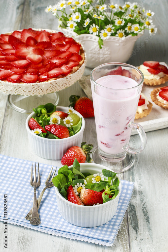 Healthy salad with lamb's lettuce (Valerianella locusta), strawb Healthy salad with lamb's lettuce (Valerianella locusta), strawb