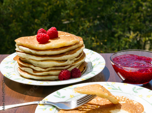 Homemade cakes: Pancake with homemade raspberry jam