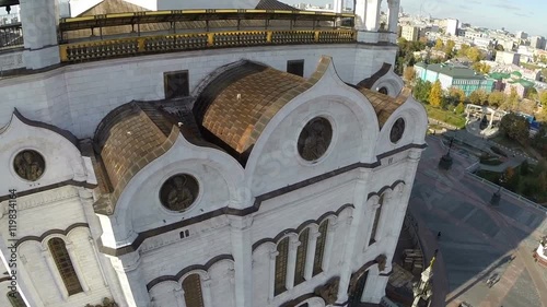 Aerial view the Cathedral of Christ the Saviour against background of city with Moscow River and Red Square Close up golden dome and cross Aerial view Moscow Russia.